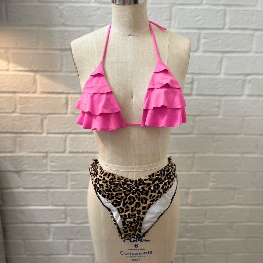 Victoria’s Secret triangle top in size L with PINK bottoms size M
